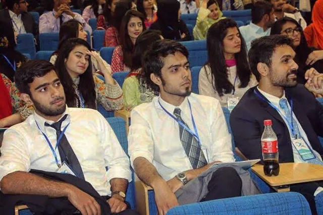 University of Central Punjab participants seated in an auditorium at LUMS for an HBS case study competition